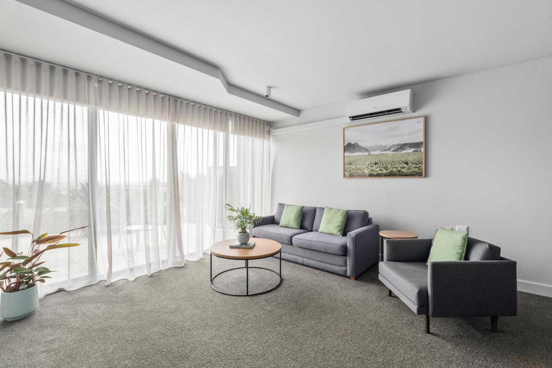 Balgownie Estate Yarra Valley Ярра-Глен Экстерьер фото A living room with a split-type air conditioner